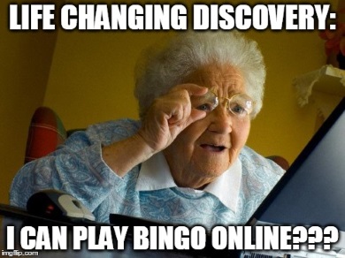 Old woman in front of a pc makes a very surprised face cause she's just dicovered that she can play bingo online